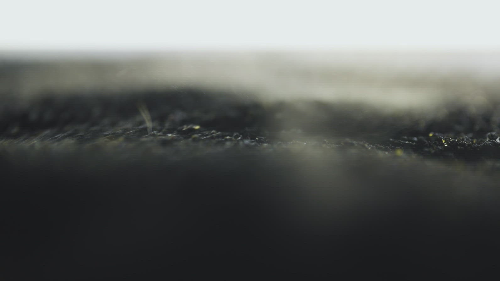 Volcanic Black Sand Rising Under Magnetic Influence Macro