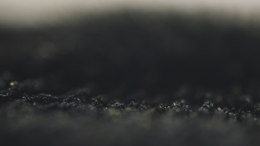 Magnetism Effect On Volcanic Sand In Macro Closeup