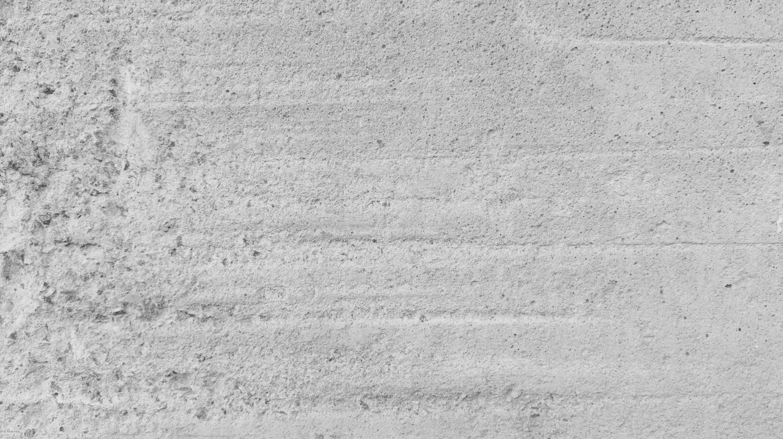 A close-up view of a textured concrete wall background