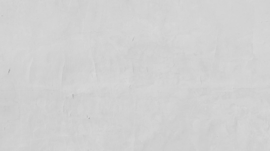 A smooth  light gray concrete wall background texture