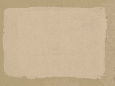 A textured wall background with a light beige paint patch square