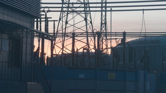 Industrial landscape with power lines and electrical equipment Industrial landscape with power lines and electrical equipment