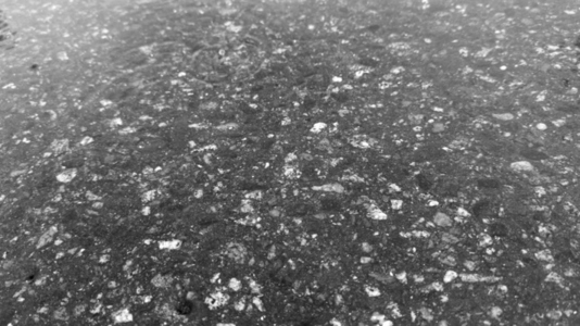 Seamless loop texture background surface with a mix of dark Seamless loop texture background surface with a mix of dark