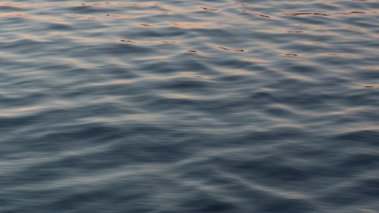 Seamless loop calm water surface with gentle ripples